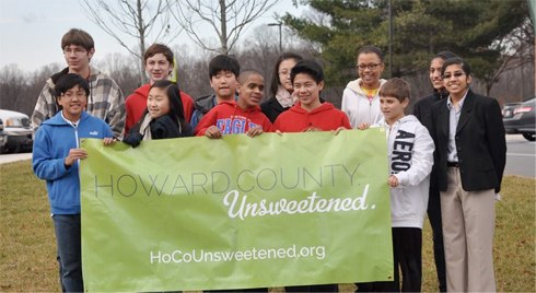 Kids with Howard County Unsweetened banner